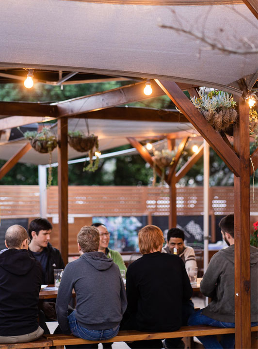 friends enjoying drinks outside